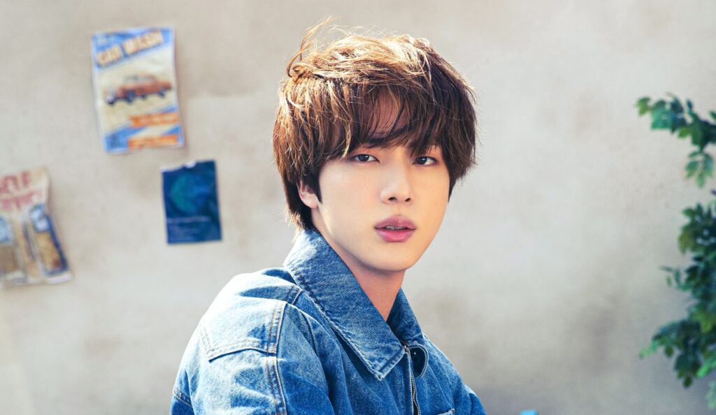 BTS' Jin shows how his forehead looks like after being hit by a window
