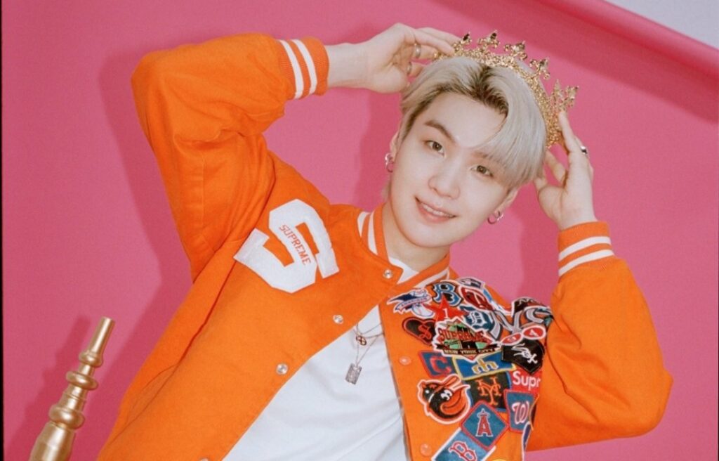 Suga criticizes agencies for turning idols into “products”