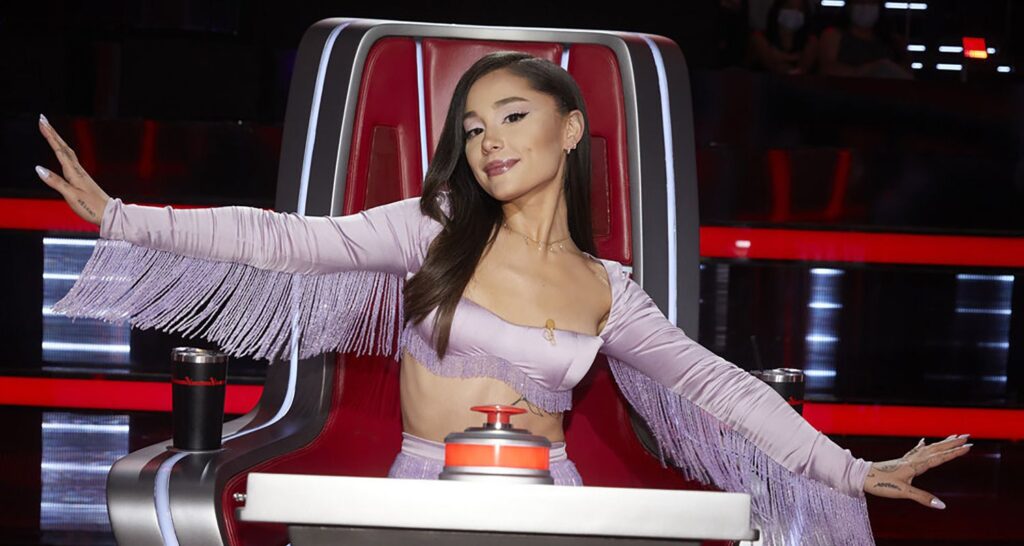 Ariana Grande cuts Blake Shelton from a group photo of The Voice judges