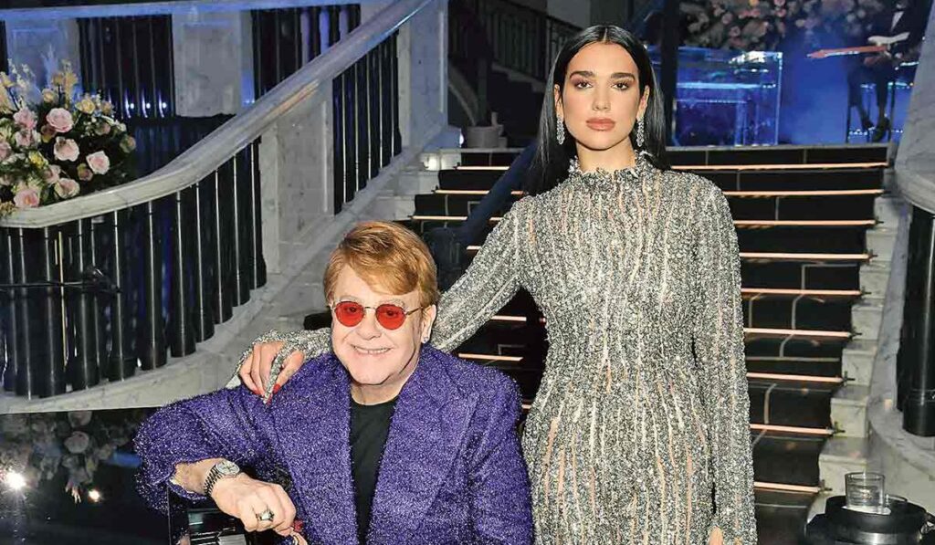 Elton John and Dua Lipa reach #1 on Billboard Chart with "Cold Water"