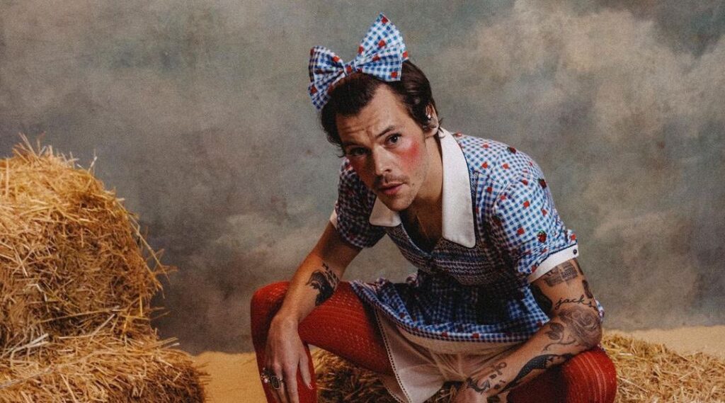 Harry Styles performs dressed as Dorothy