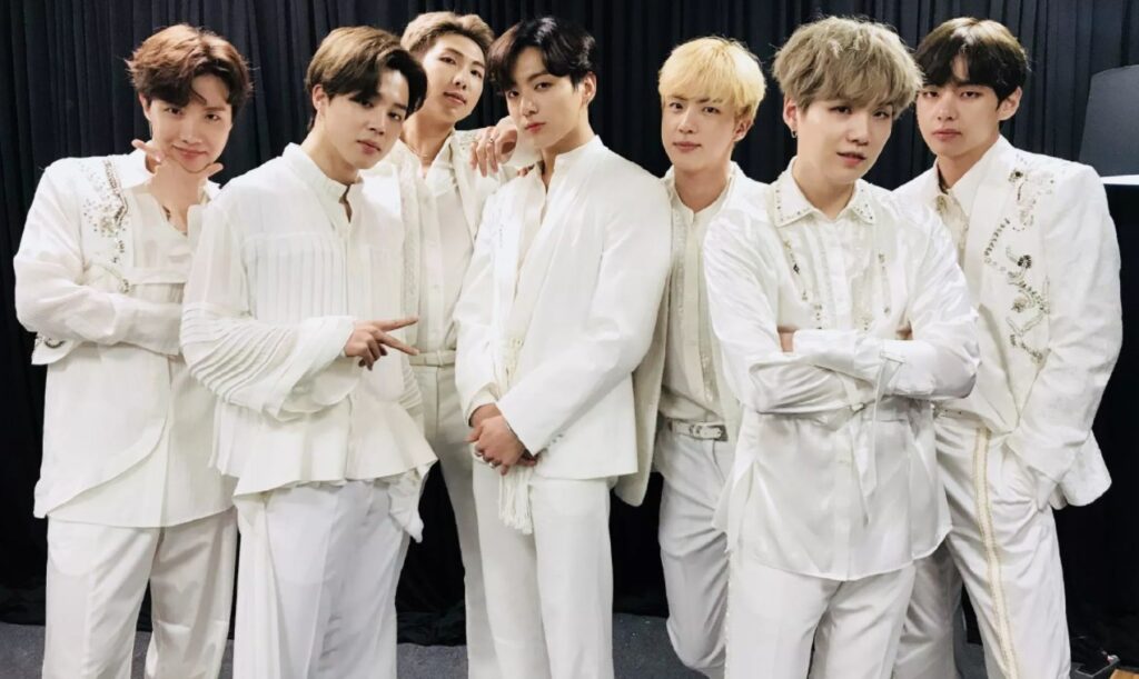 BTS' members comfort a little girl, making their fans tear up