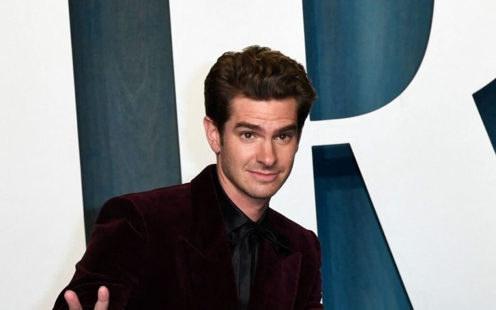 Andrew Garfield imitates the slap Will Smith gave to Chris Rock at the Oscars
