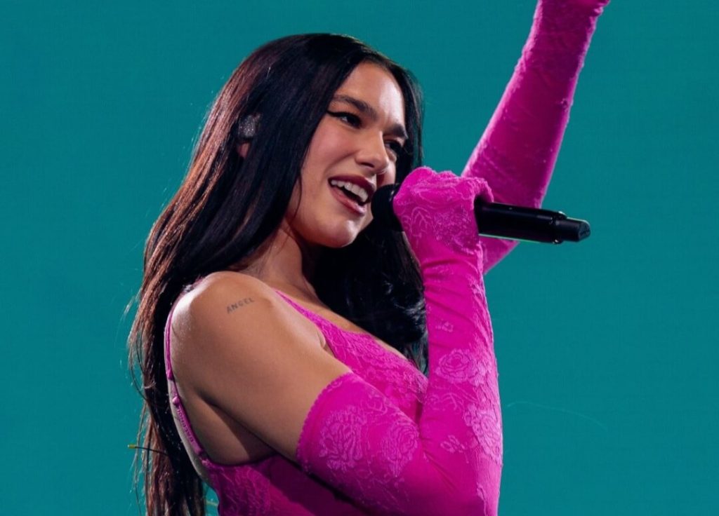 Dua Lipa suffers fall on stage during concert in Italy