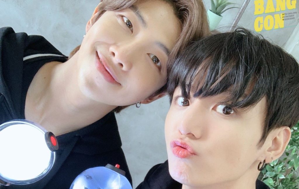 BTS: Jungkook is caught playing with Namjoon's butt in a sassy way