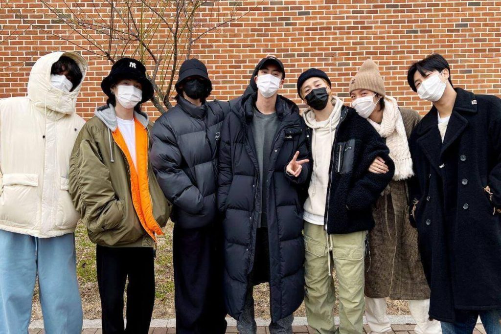 BTS' members say goodbye to Jin at the barracks with emotional group photo