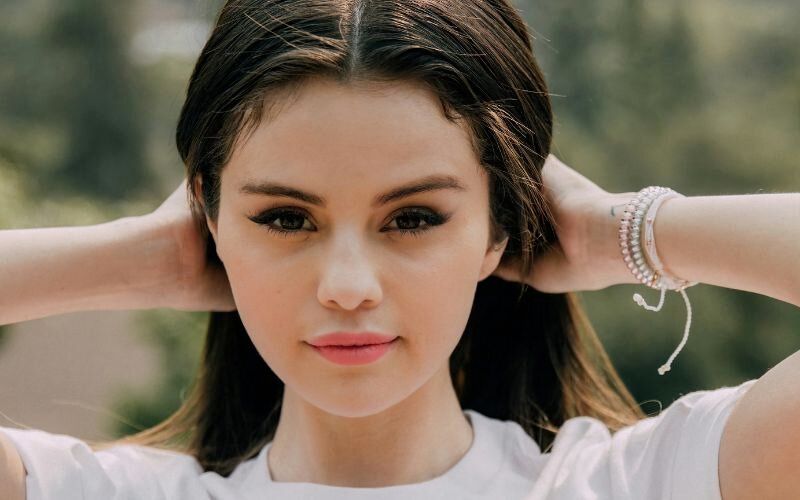 Selena Gomez showing most of her skin in a Mexico beach celebrating New Year