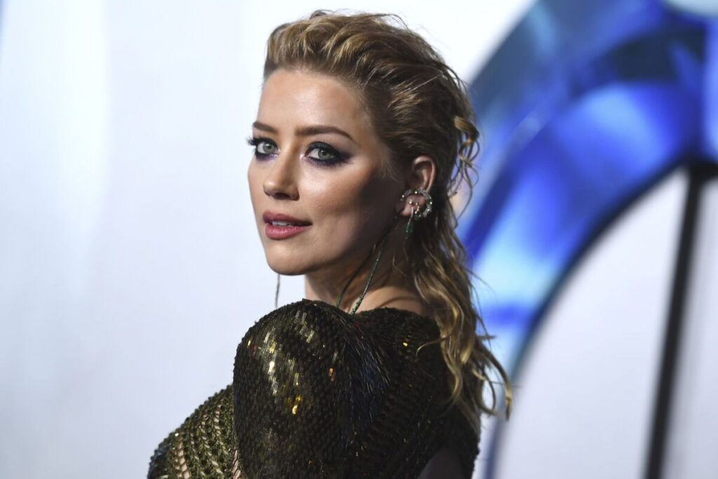 Amber Heard might be mocking Johnny Depp’s fans by returning to the big screen