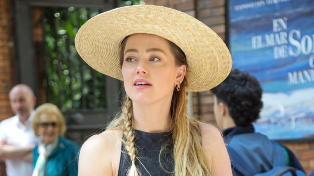 Amber Heard is caught happier than ever living her new life in Spain after leaving Hollywood