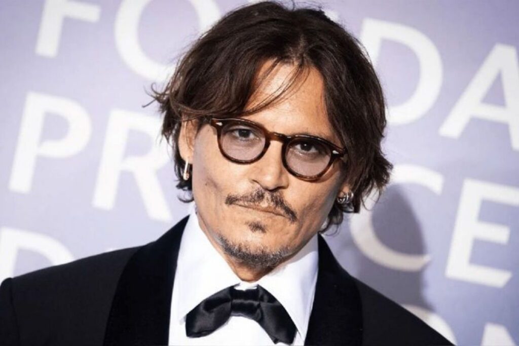 Johnny Depp signs a million-dollar deal and teases Amber Heard's fans