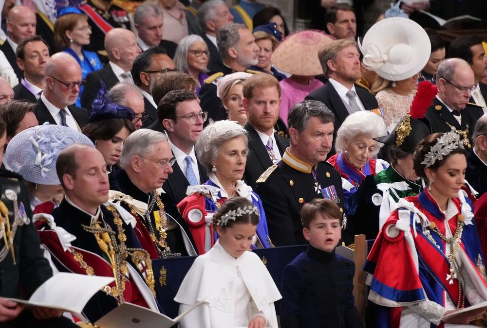 King Charles III and the royal family pose on the balcony without Prince Harry after the coronation