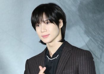 SHINee's Taemin's adorable reaction after a wardrobe malfunction in the middle of a performance