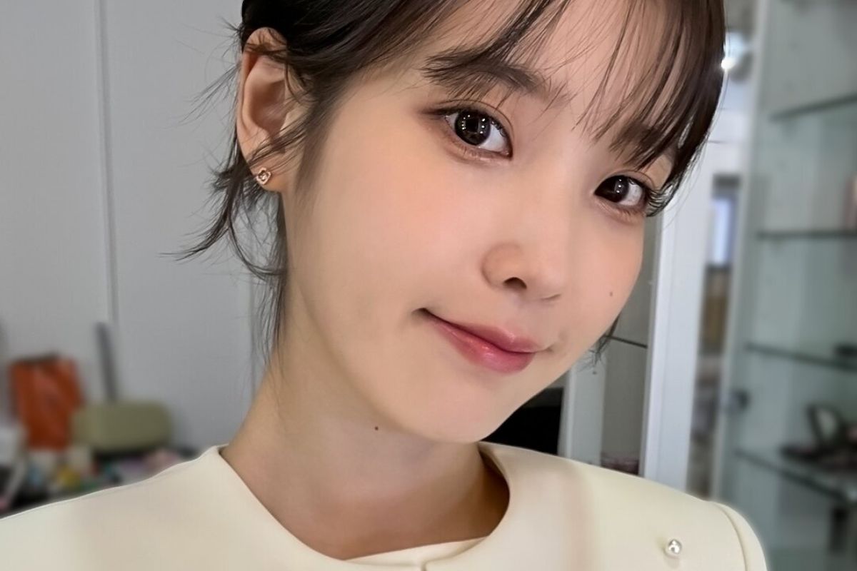 IU unveils comeback date with new mood film