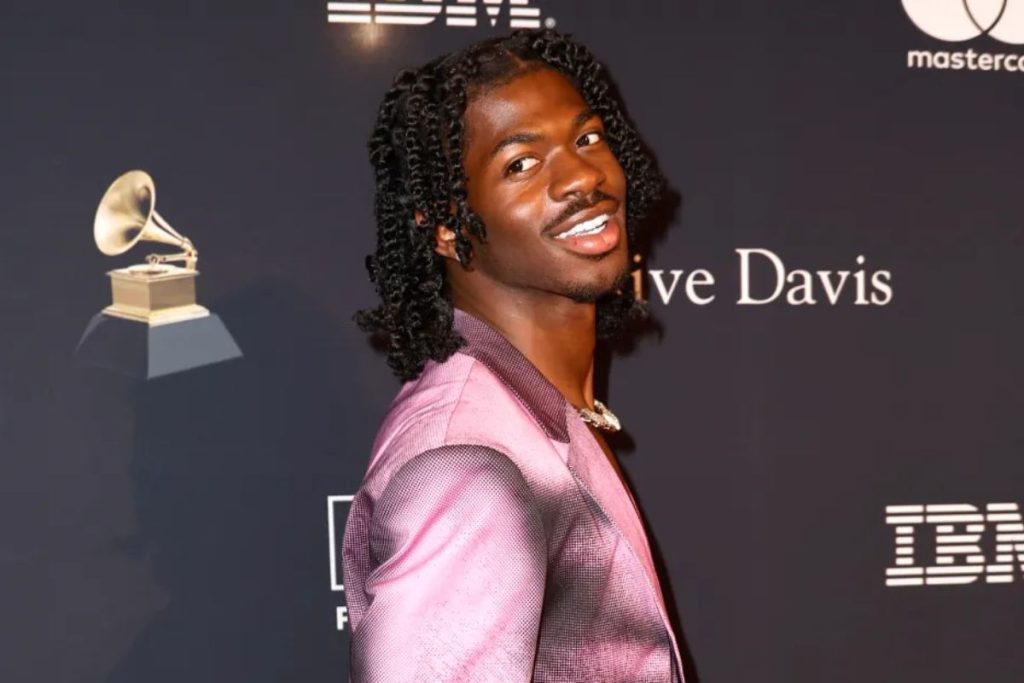 Lil Nas X responds to criticism for alleged mockery of religion by posing on a cross