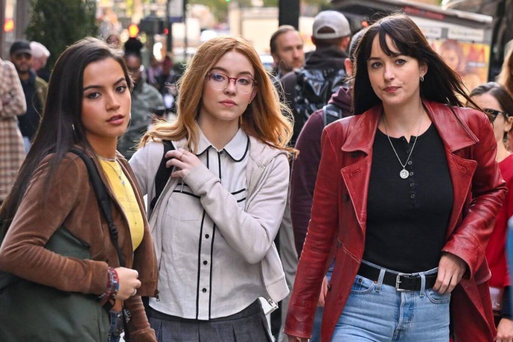 The new official poster for 'Madame Web' reveals the costumes of the superheroes in the film