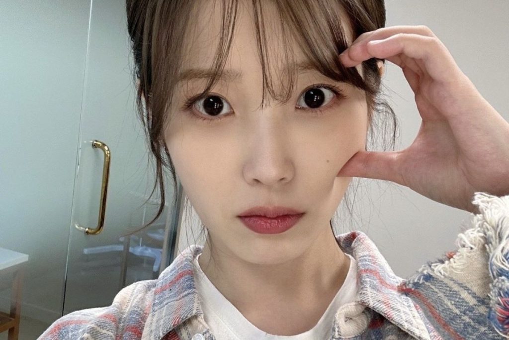 IU earns the No. 1 spot in “Music Core” with “Love Wins All”