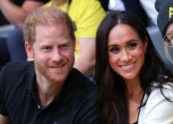 Prince Harry goes viral for his confrontational reaction to Meghan Markle kissing his teammate