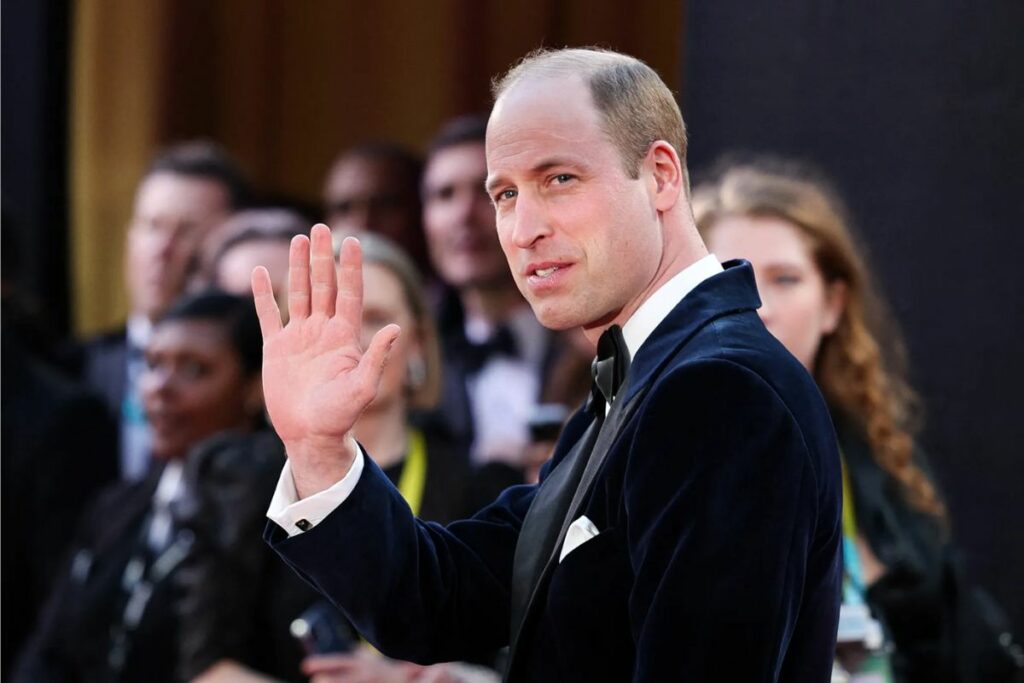 Prince William visits a school after being invited by a young student