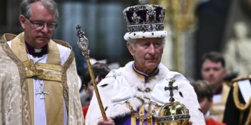 King Charles III's coronation anniversary was celebrated with ceremonial arms across London
