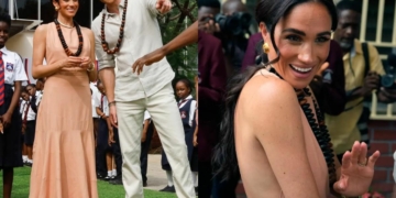 Meghan Markle wore a long dress that was supposedly a nod to the Royal Family