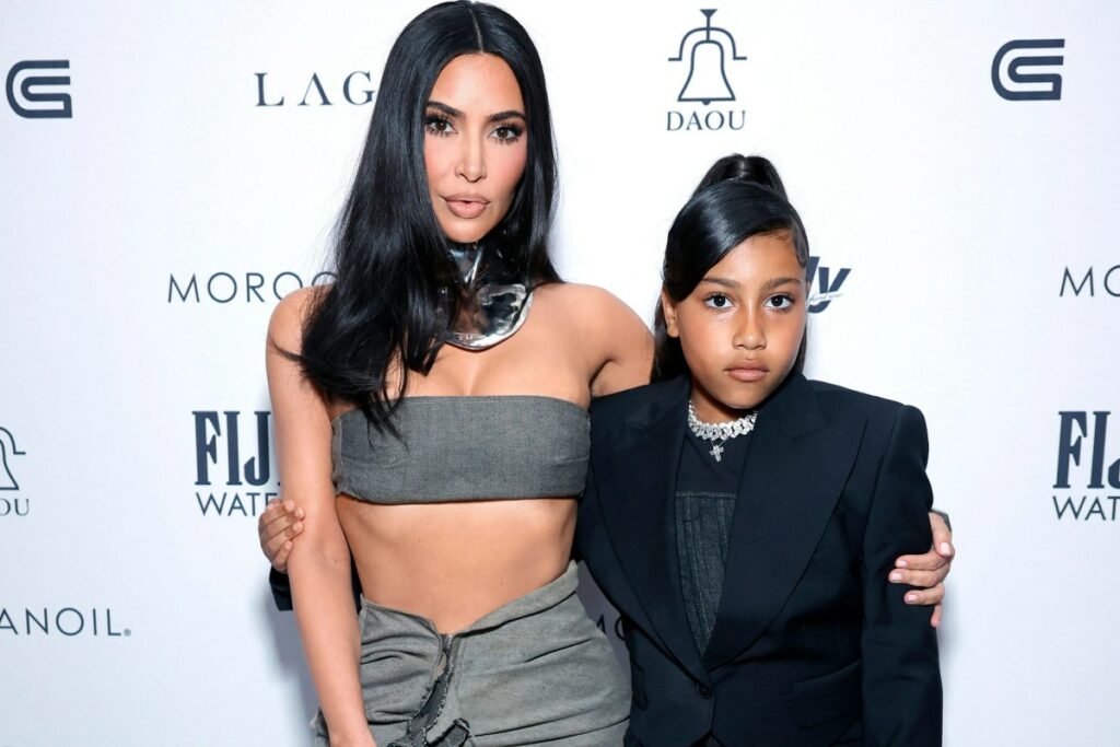 Kim Kardashian's daughter gives the side-eye at her mom's friends, giving a tense vibe