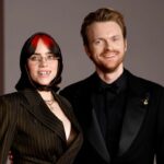 Finneas defends sister Billie Eilish after her 'Guess' verse is accused of being predatory