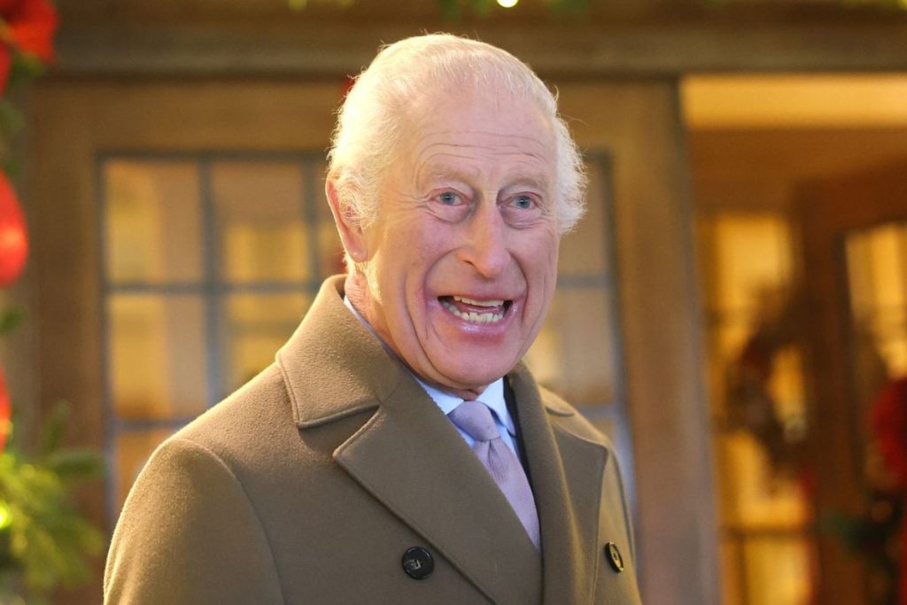King Charles III decorates the Christmas tree