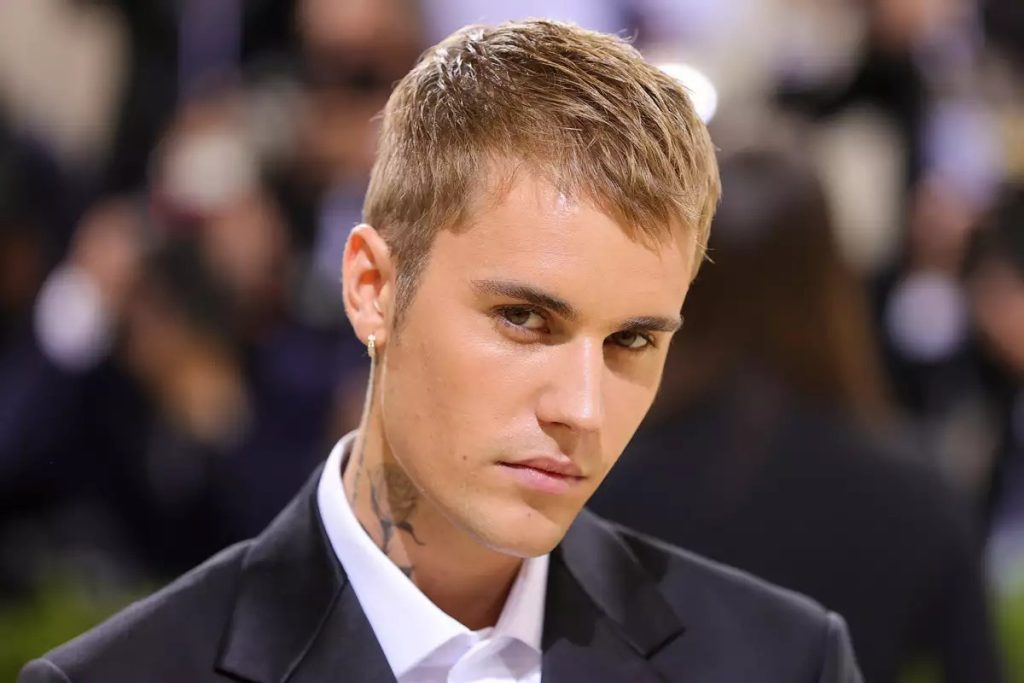 Justin Bieber owns up to anger issues and teases a comeback