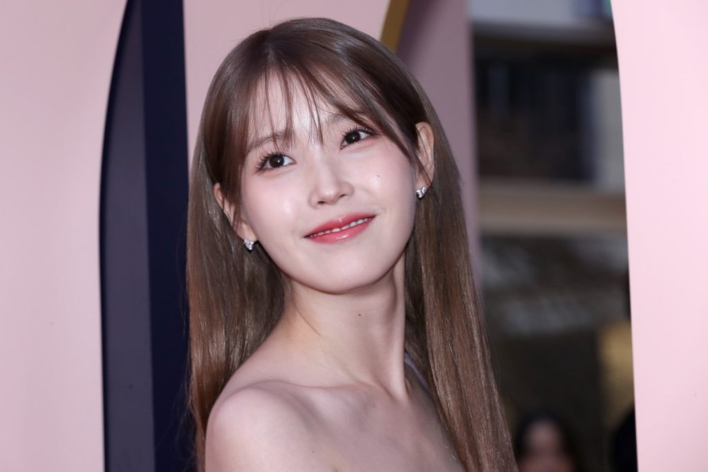 IU dragged into wild rumors on a podcast as fans express their outrage