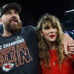 Travis Kelce gives off husband vibes at Taylor Swift charity auction