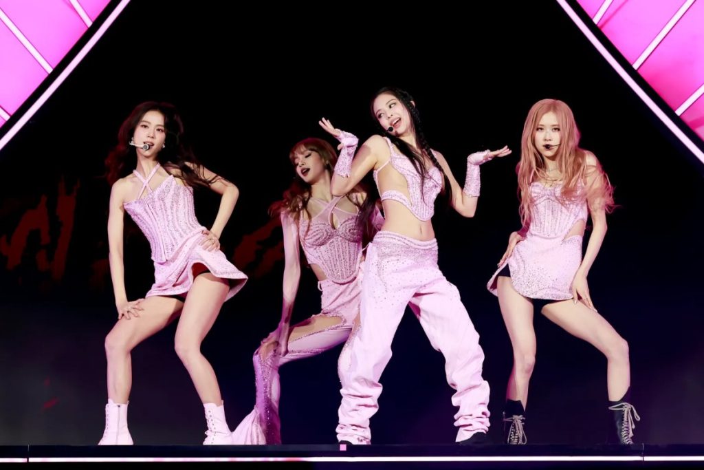 BLACKPINK performing in pink outfits