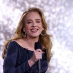 Adele races back into the spotlight with a new public appearance after one year out of the public eye