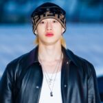 Bang Chan walks around the Stray Kids recording set shirtless