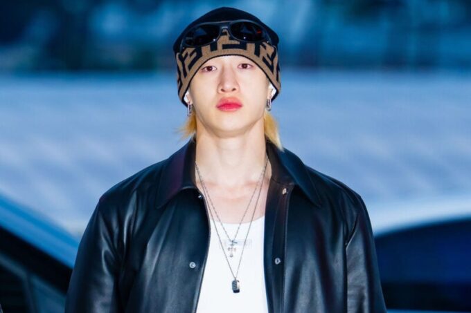 Bang Chan walks around the Stray Kids recording set shirtless