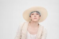 G-Dragon stars a heated online debate after new photos taken in the United States