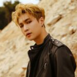 Was EXO’s Lay absent at a fan meeting due to tense political tensions between China, Japan, and South Korea