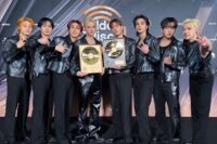 Stray Kids' Bang Chan had the sweetest shy reaction when he was caught throwing hearts