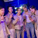 EXO members share a group photo mocking D.O.'s iconic 2013 outfit