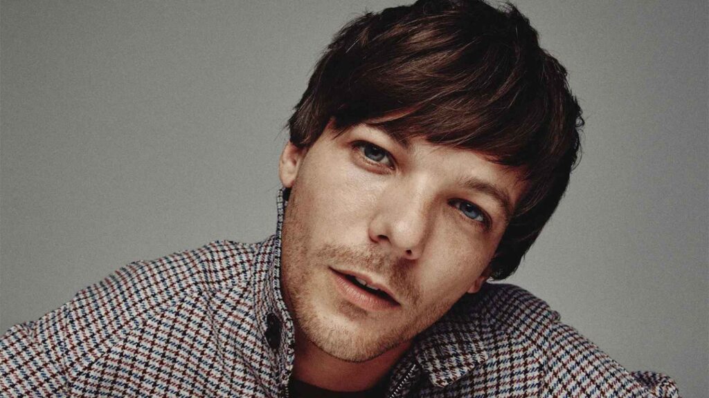 One Direction’s Louis Tomlinson says “What Makes You Beautiful” felt corny to perform