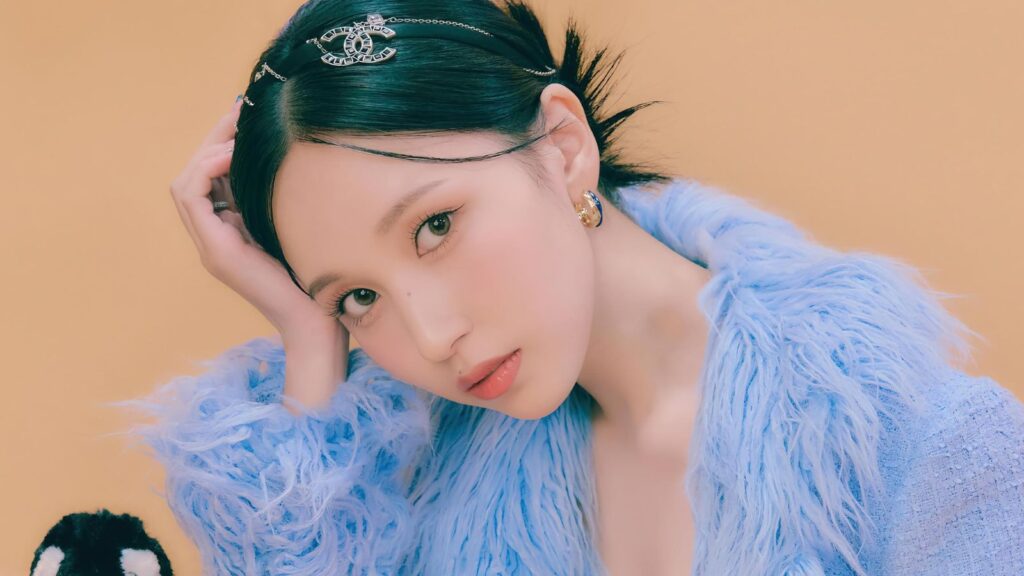 TWICE's Mina drew attention for performing with a rare veil covering her face. Here's the reason