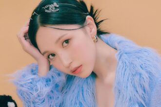 TWICE's Mina drew attention for performing with a rare veil covering her face. Here's the reason