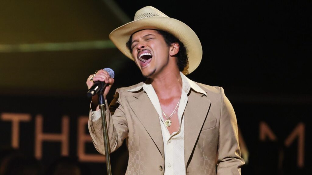 Bruno Mars reveals he is 'debt-free' during a concert in the United States Bruno Mars reveals he is 'debt-free' during a concert in the United States