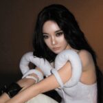AESPA's Ningning responds to a comment asking why she recently shows her boobs so much