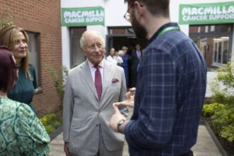 King Charles shares emotional moments during visit to cancer center