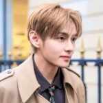 BTS' V gives a jacket to a fan at a concert for the second time