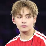 BTS' V stuns in a new custom FC Bayern Munich kit at a recent concert