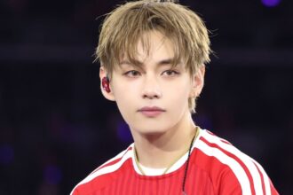 BTS' V stuns in a new custom FC Bayern Munich kit at a recent concert