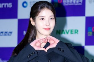 IU postpones her comeback plans due to health issues