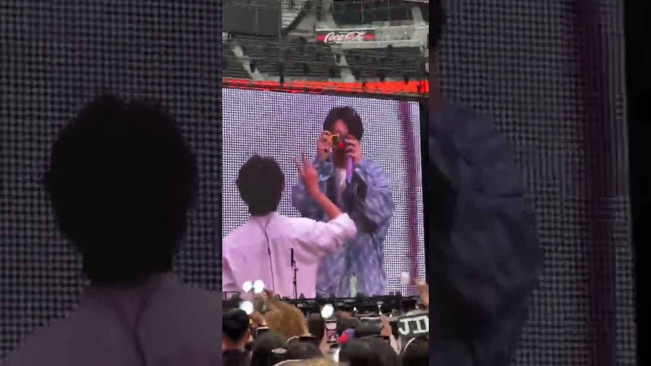 Jungkook taking V's photos