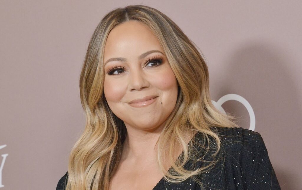 Hermana de Mariah Carey la demanda por suma millonaria y la acusa de difamación
